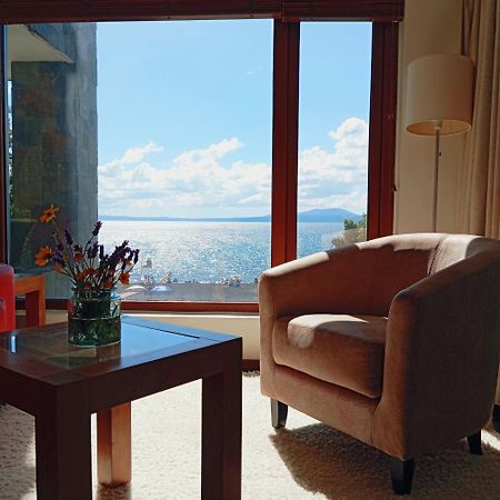 Hotel Playa Grande Suites Пукон Экстерьер фото
