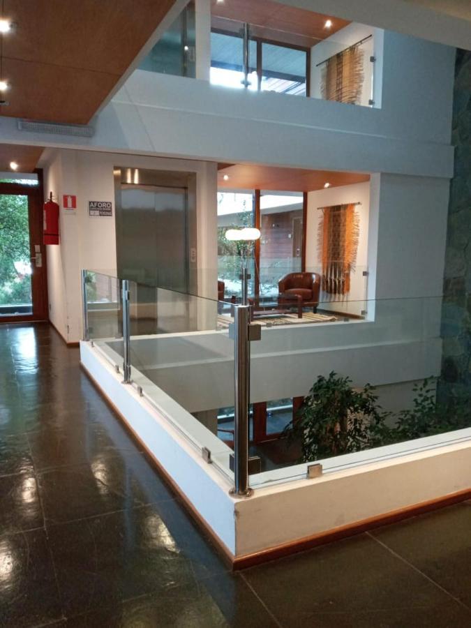 Hotel Playa Grande Suites Пукон Экстерьер фото