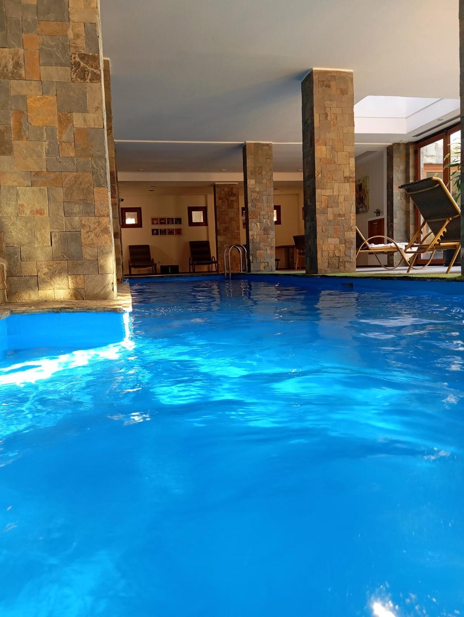 Hotel Playa Grande Suites Пукон Экстерьер фото