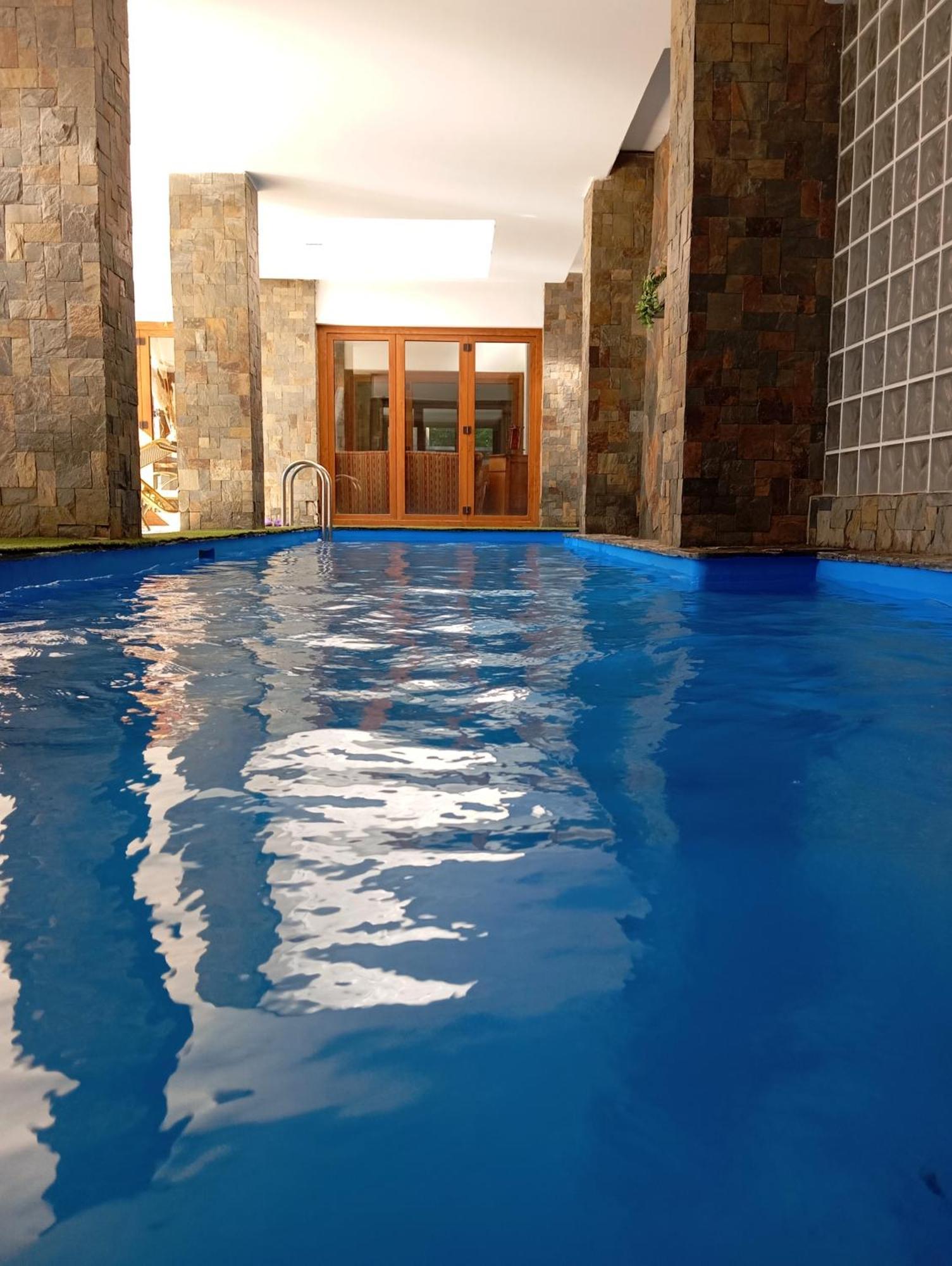 Hotel Playa Grande Suites Пукон Экстерьер фото