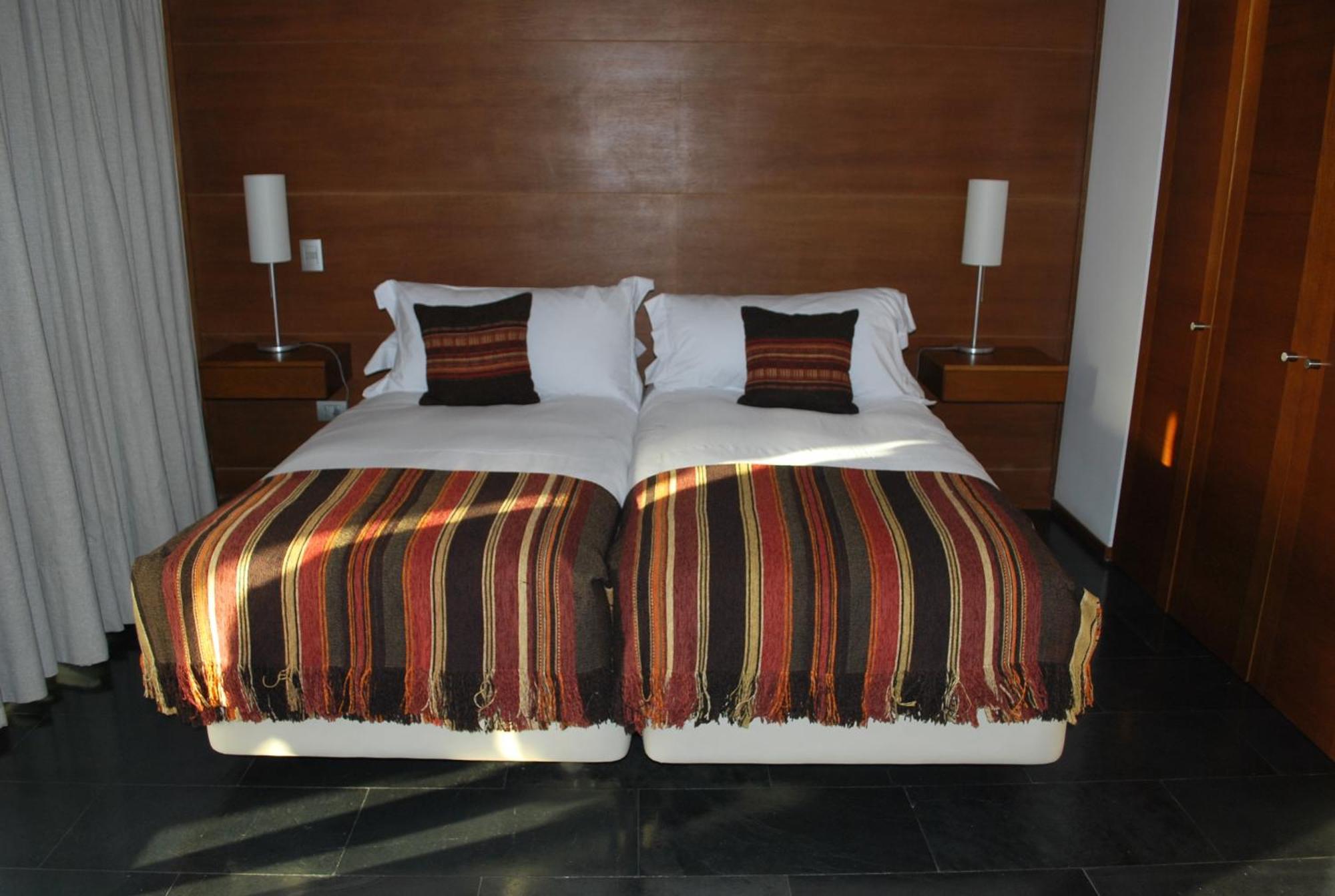 Hotel Playa Grande Suites Пукон Экстерьер фото