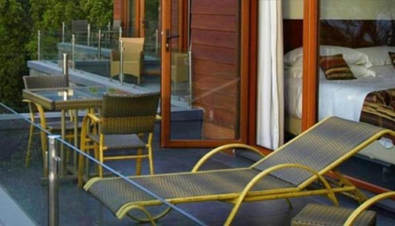 Hotel Playa Grande Suites Пукон Экстерьер фото
