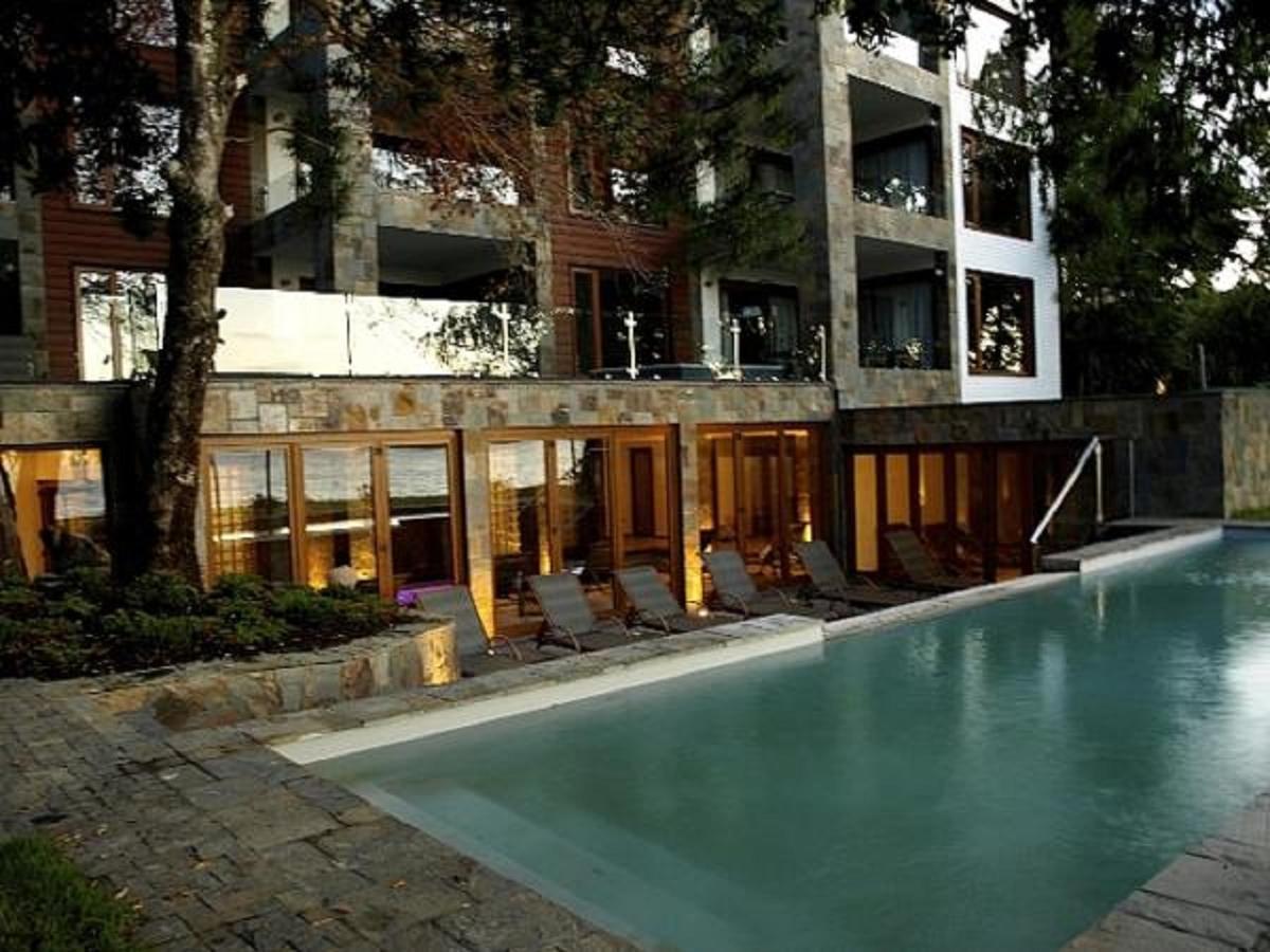 Hotel Playa Grande Suites Пукон Экстерьер фото