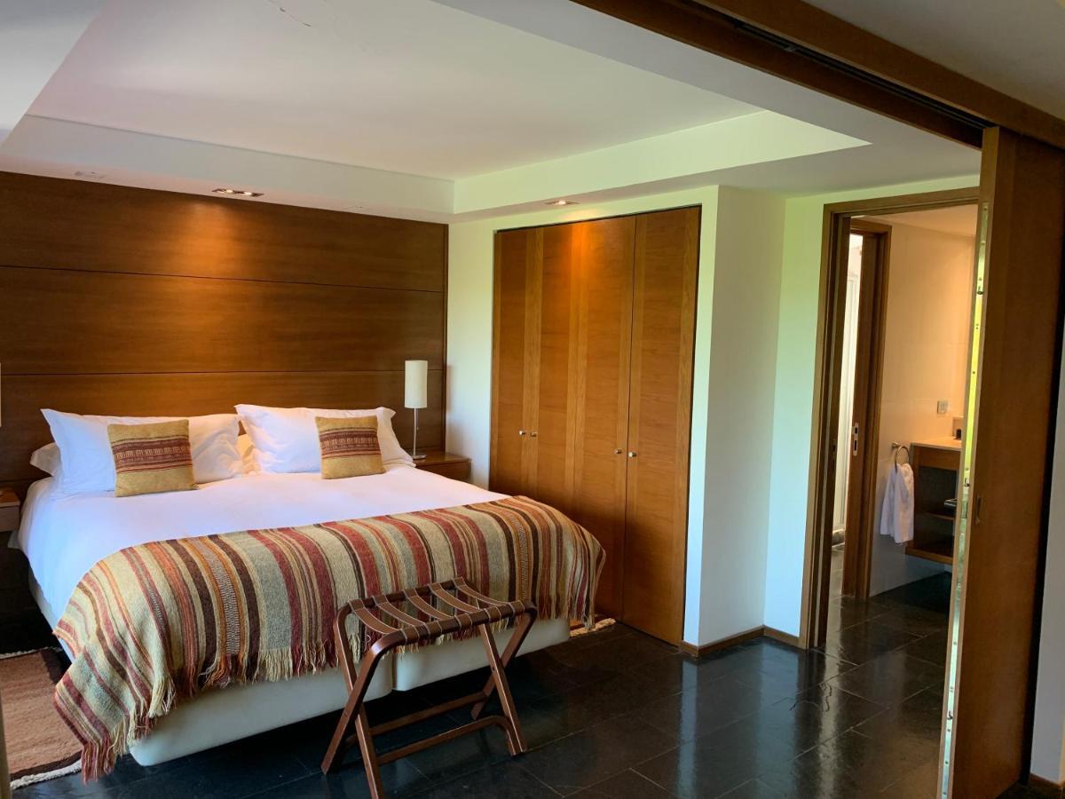Hotel Playa Grande Suites Пукон Экстерьер фото