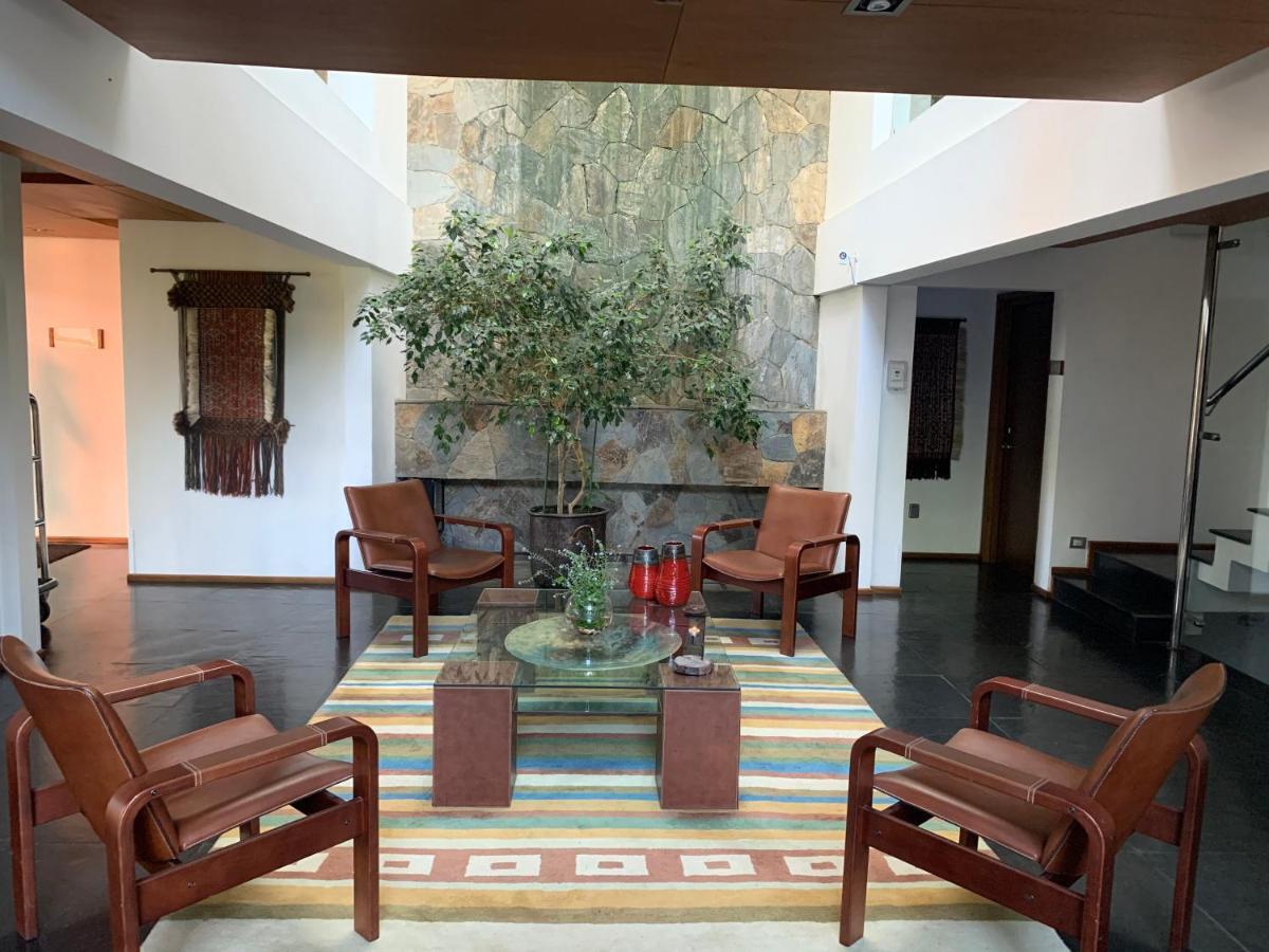 Hotel Playa Grande Suites Пукон Экстерьер фото