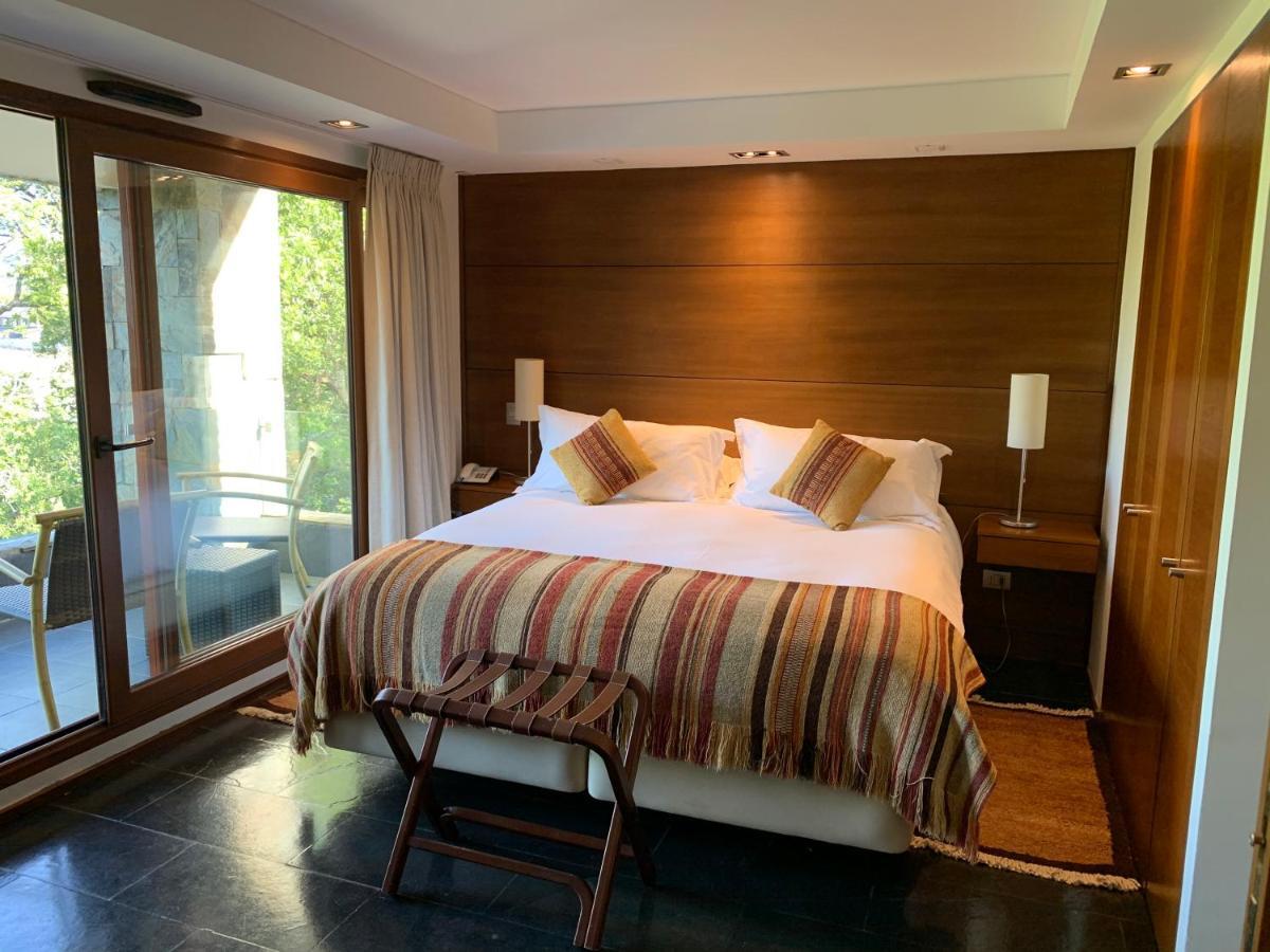 Hotel Playa Grande Suites Пукон Экстерьер фото