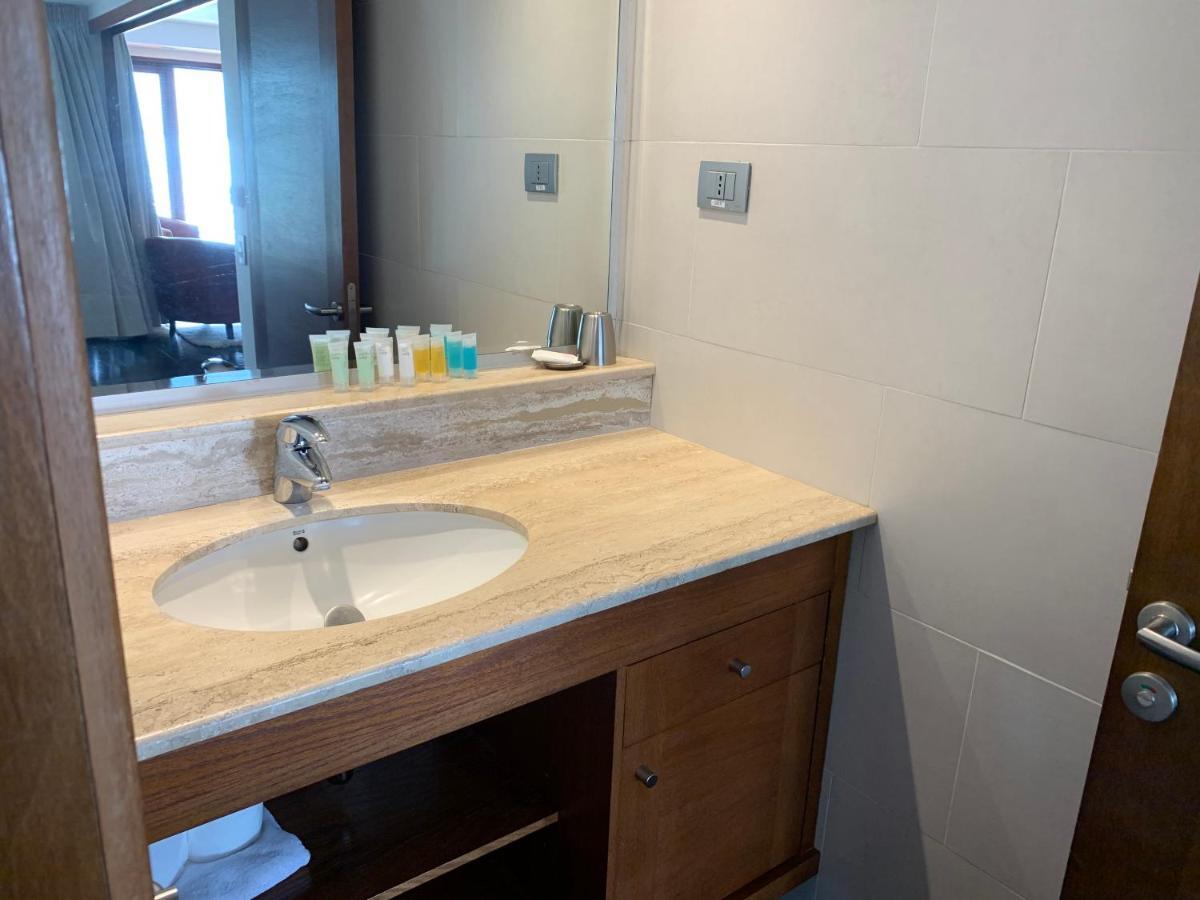 Hotel Playa Grande Suites Пукон Экстерьер фото
